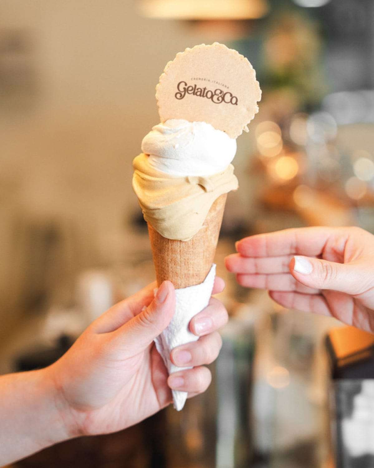Handing a gelato cone